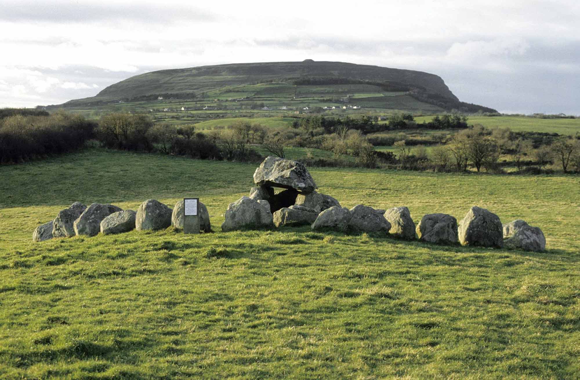 Carrowmore megalithic tombs with Queen Maeve's Cairn on Knocknarea in background